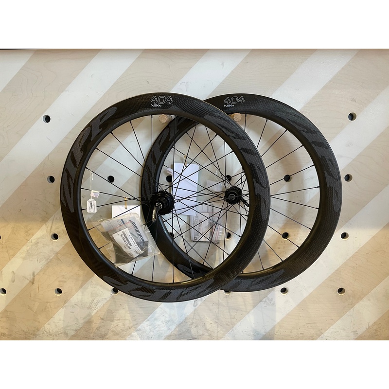 ZIPP 404 NSW CARBON CLINCHER WHEELSET DB QR TL V1 CPG